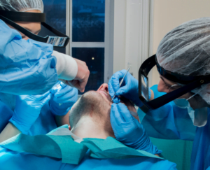 A man recieving a beard transplant at vinci hair clinic