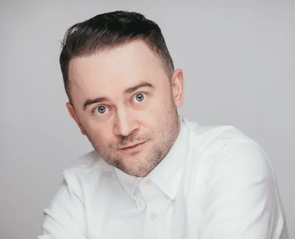 Actor Stephen Purdon posing with his new hairline after a Hair Transplant in London